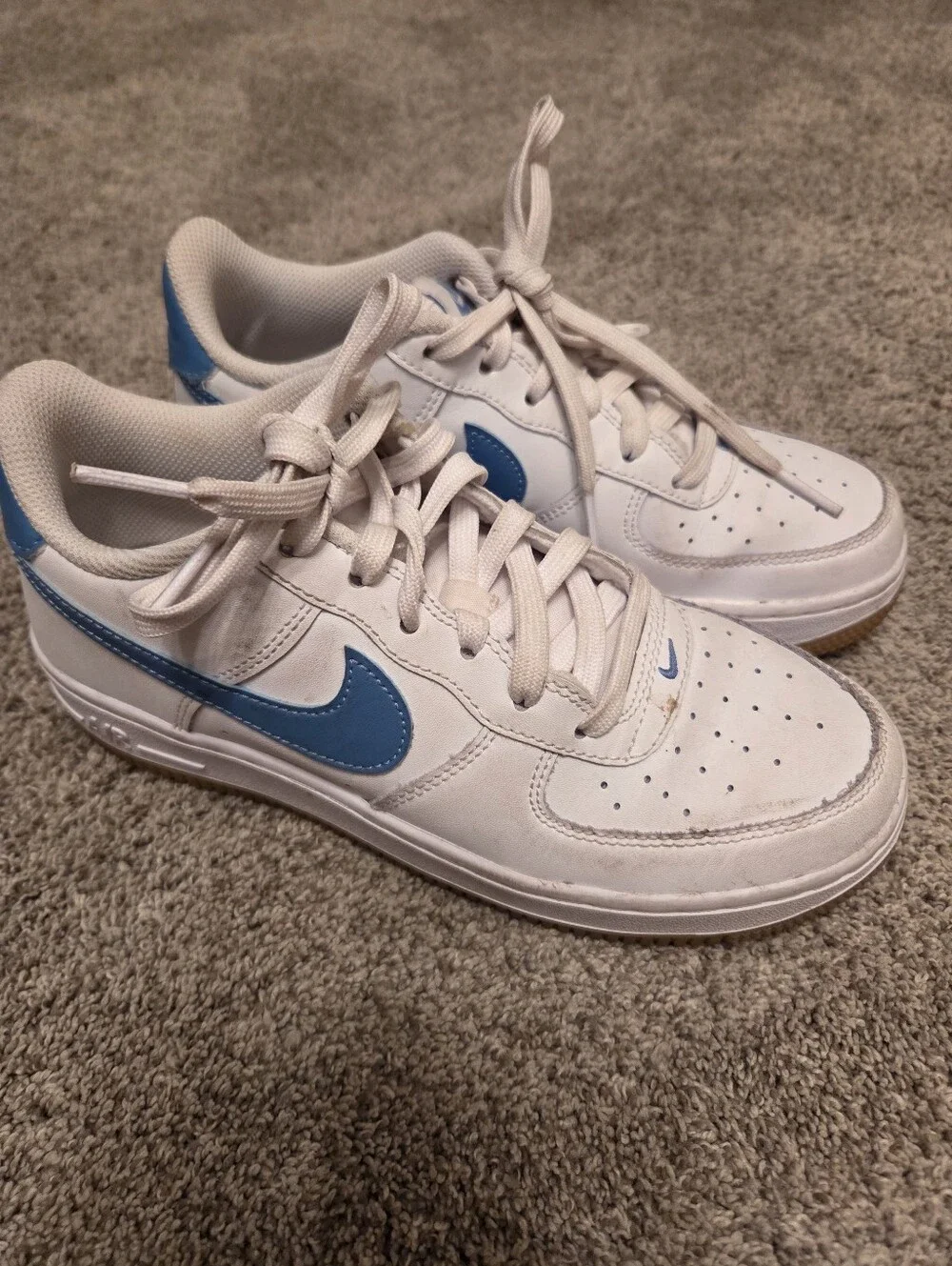 Nike Kids White Sneakers with Blue Swoosh